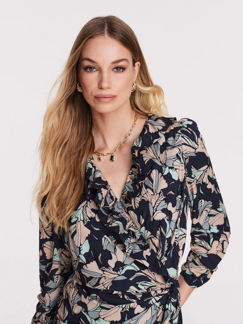 Asymmetrical dark dress with pastel pattern