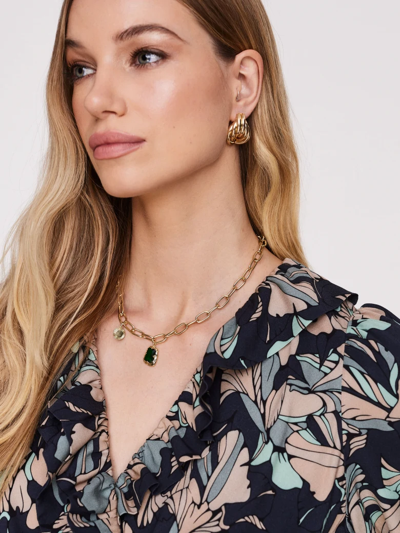 Asymmetrical dark dress with pastel pattern