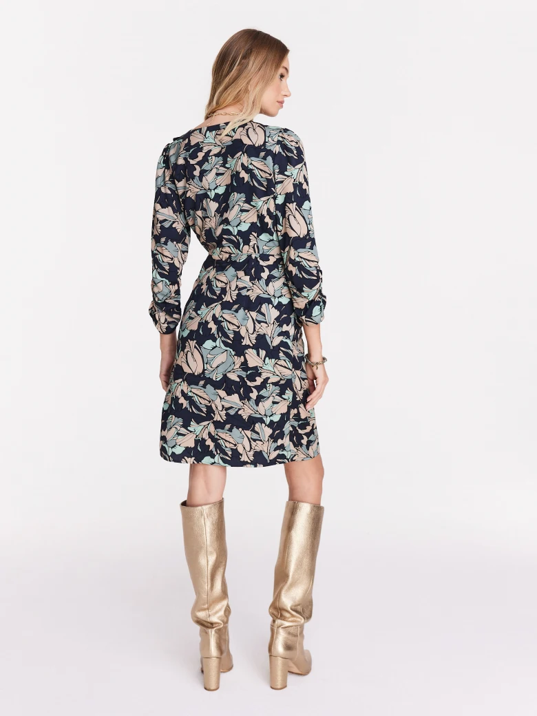 Asymmetrical dark dress with pastel pattern