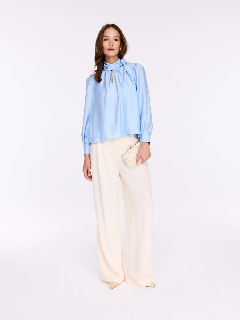 Elegant blue shirt with ties