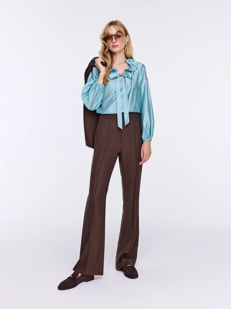 Blue shirt with frills and puffed sleeves