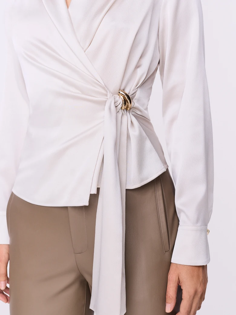 Wrap-around satin blouse with ruffles