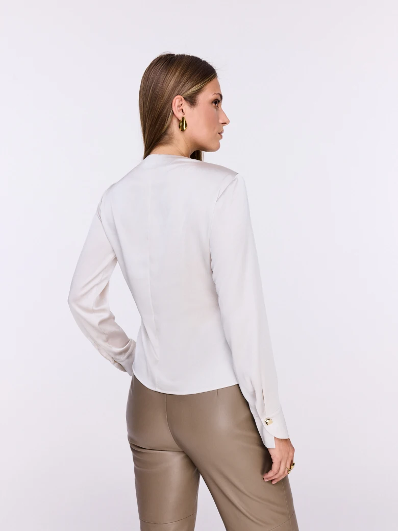 Wrap-around satin blouse with ruffles