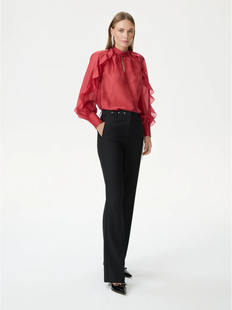 Red satin blouse with decorative ruffles