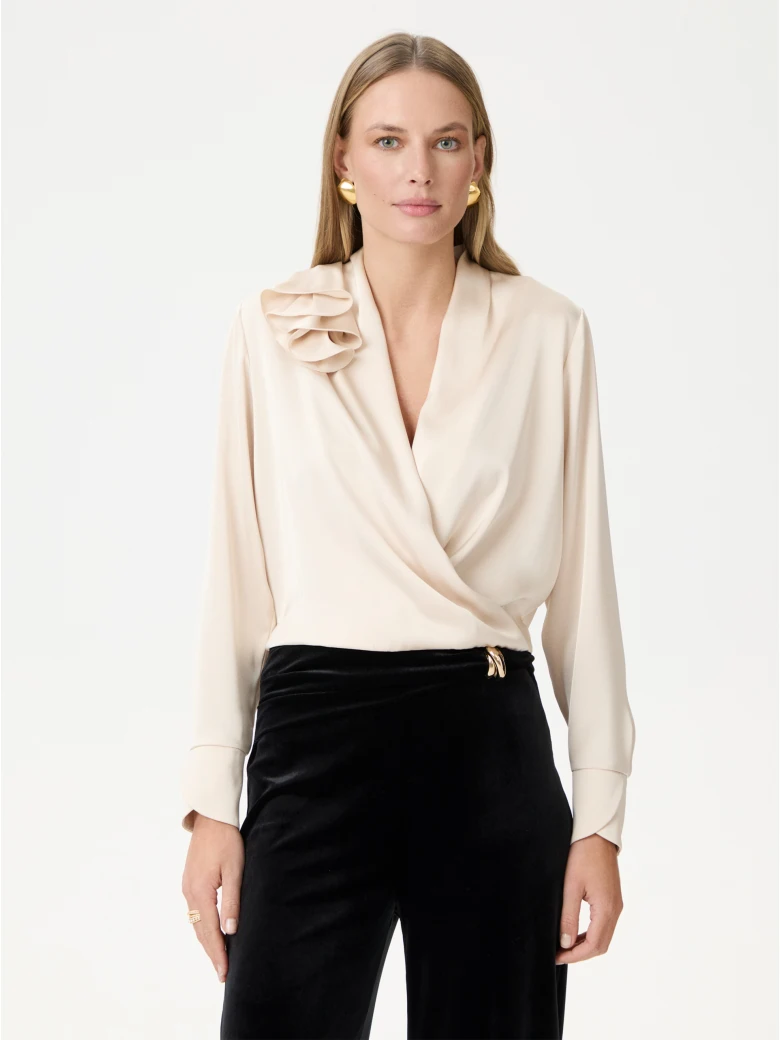High-waisted black velour pants
