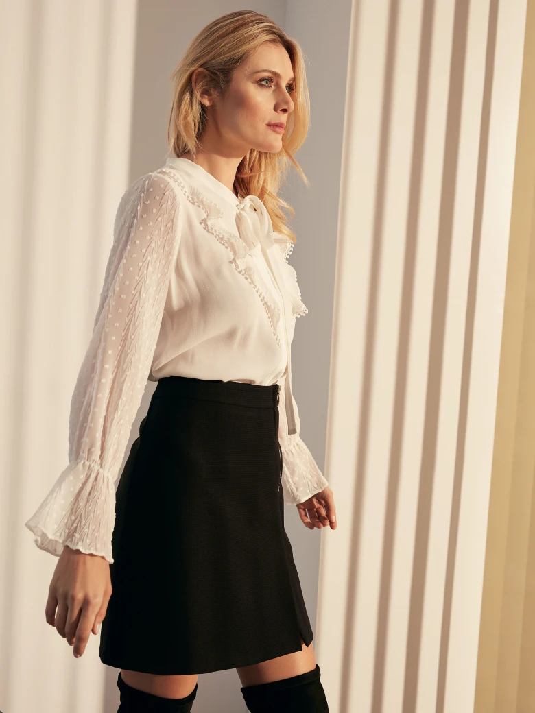 TRAPEZE SKIRT WITH CUT-OUTS
