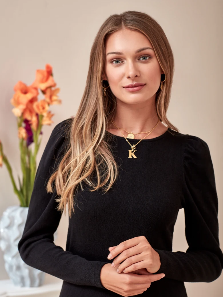 BLACK DRESS WITH BUFFETS