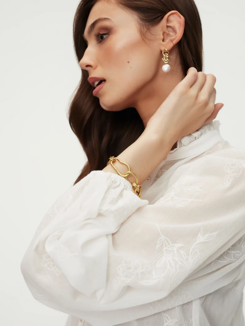 White blouse with wide sleeves