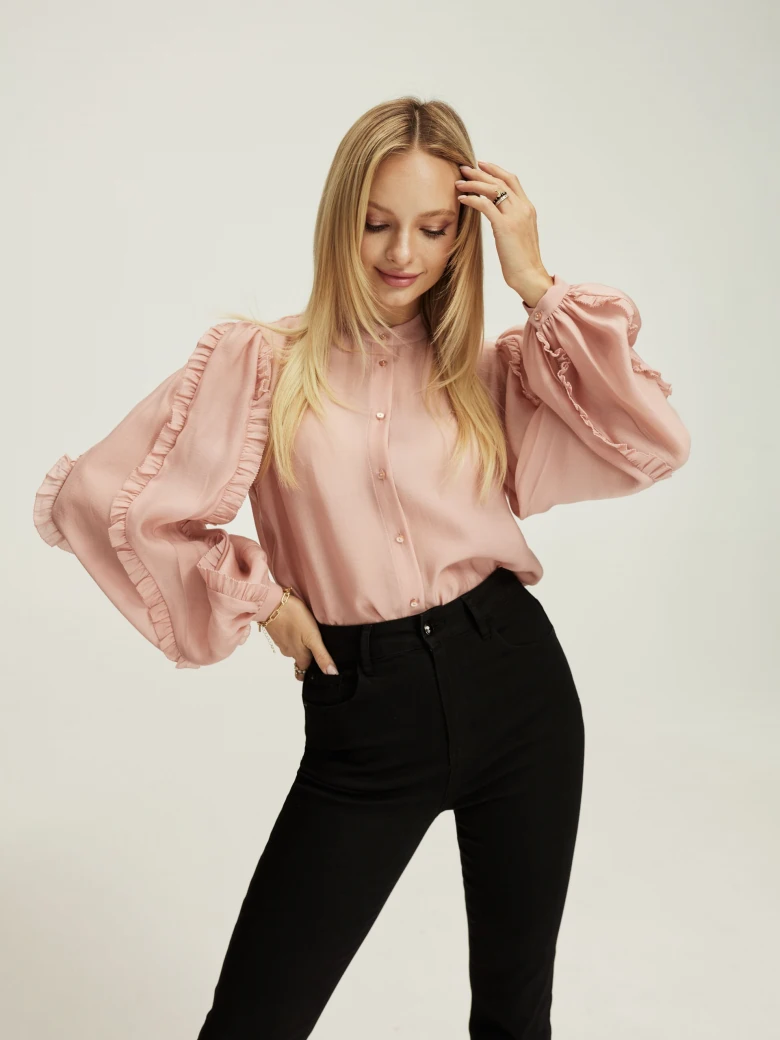 Pink blouse with ruffles on the sleeves