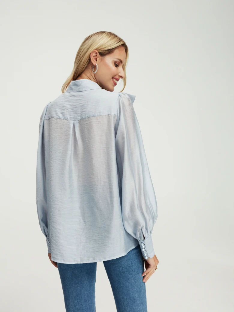 Blue blouse with ruffles