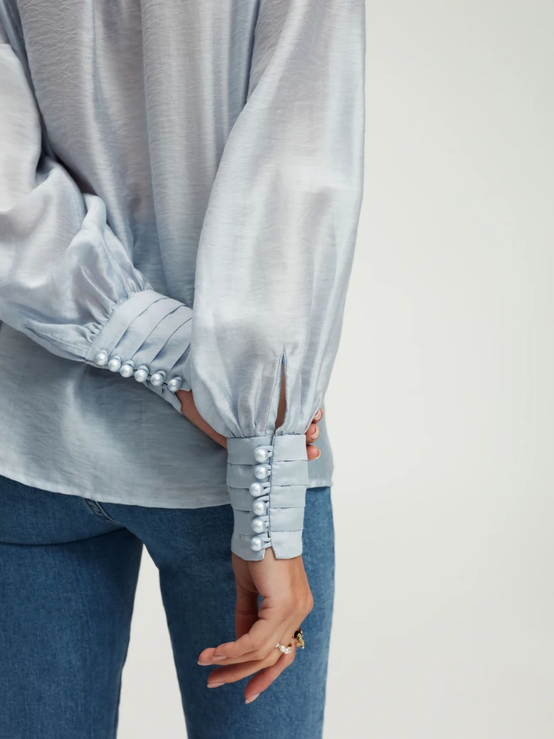 Blue blouse with ruffles