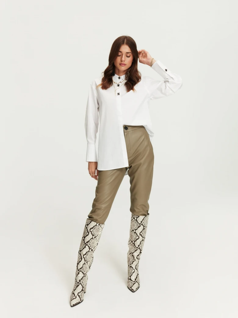 White shirt with decorative buttons