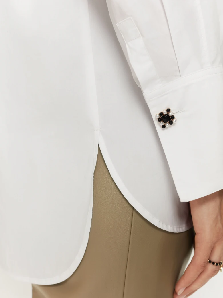 White shirt with decorative buttons