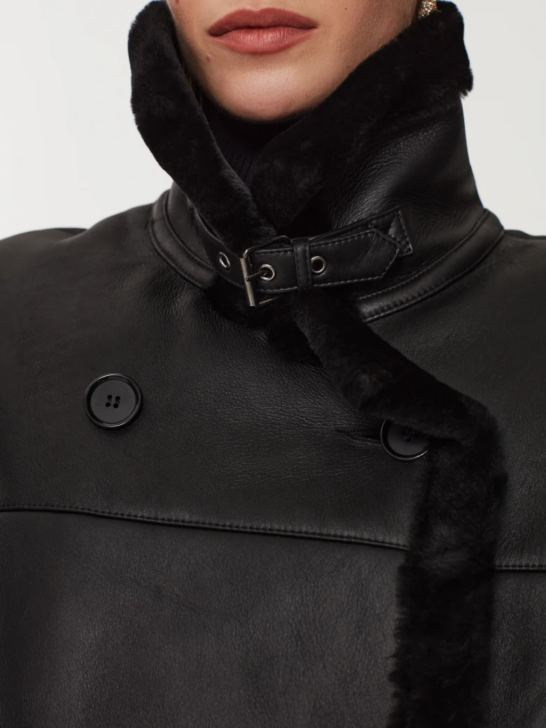 Black double-breasted sheepskin coat