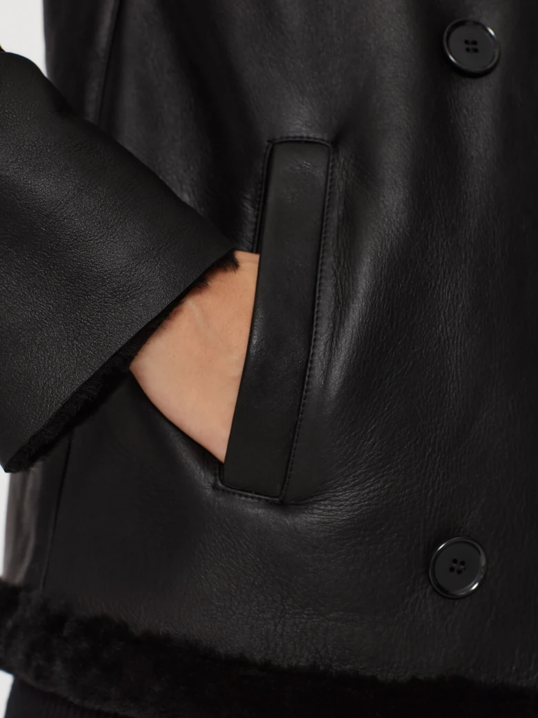 Black double-breasted sheepskin coat