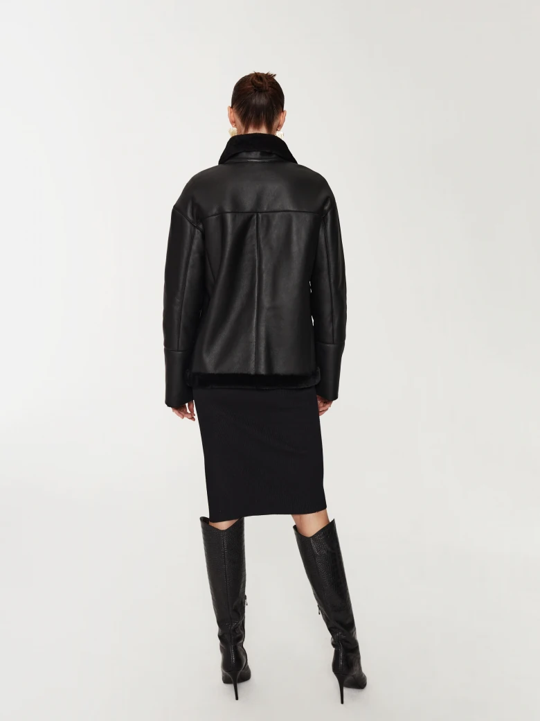 Black double-breasted sheepskin coat