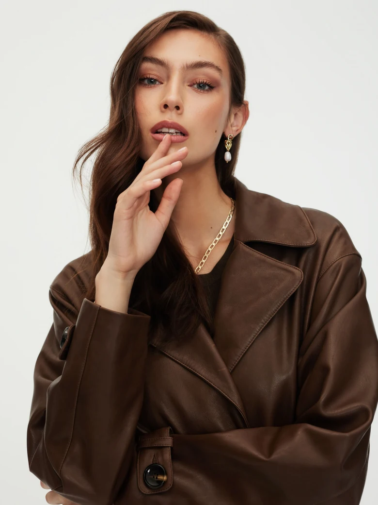 Leather coat in brown color