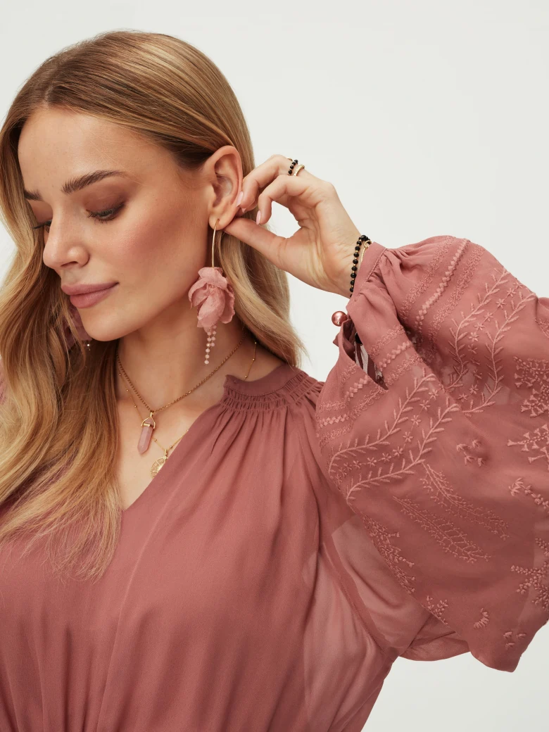 Pink mini dress with laced details