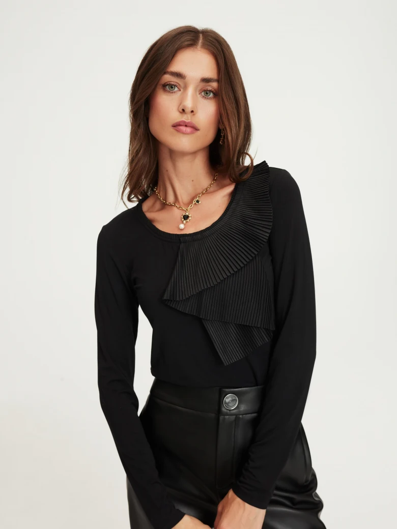 Black faux leather pants