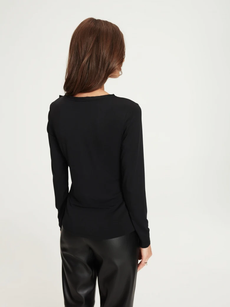Black faux leather pants