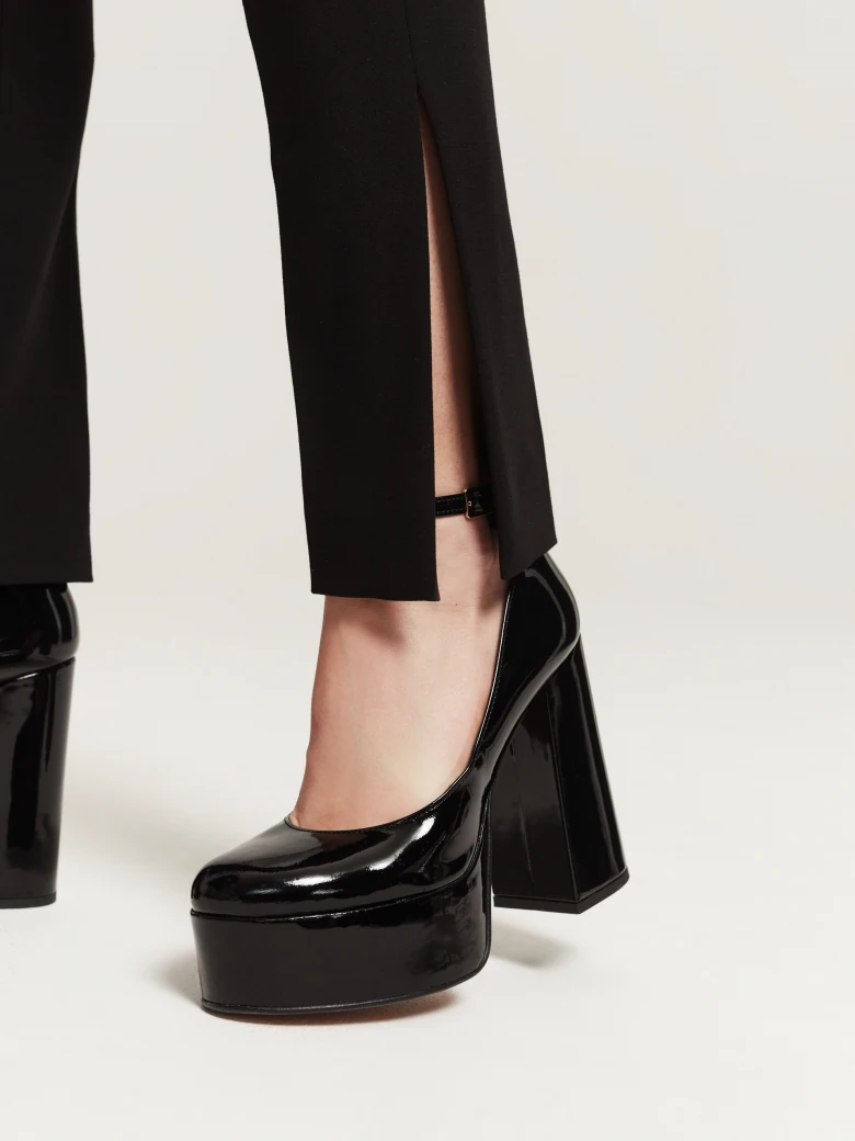 Black high-waisted cigarette pants