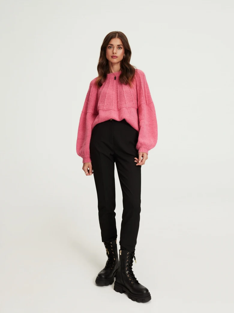 Pink sweater with a cutout on the back