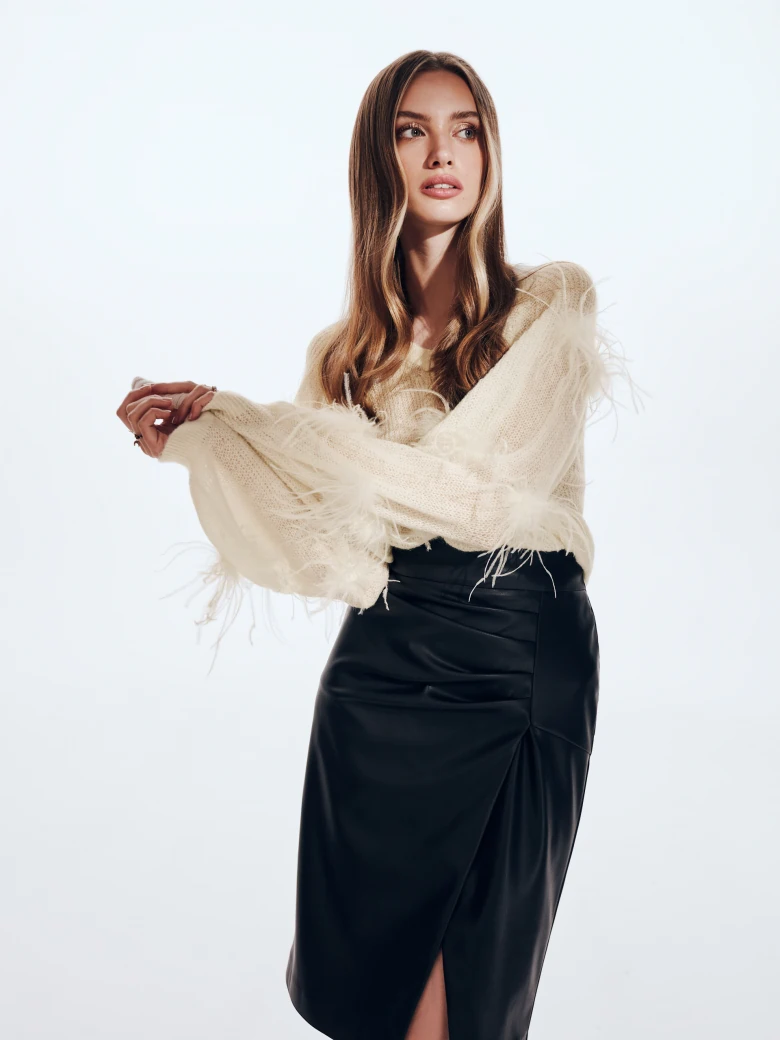 Beige sweater with ostrich feathers