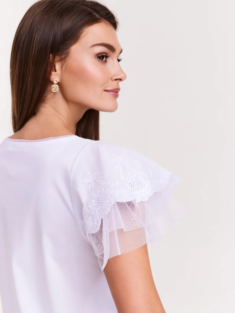 White blouse with lace sleeves