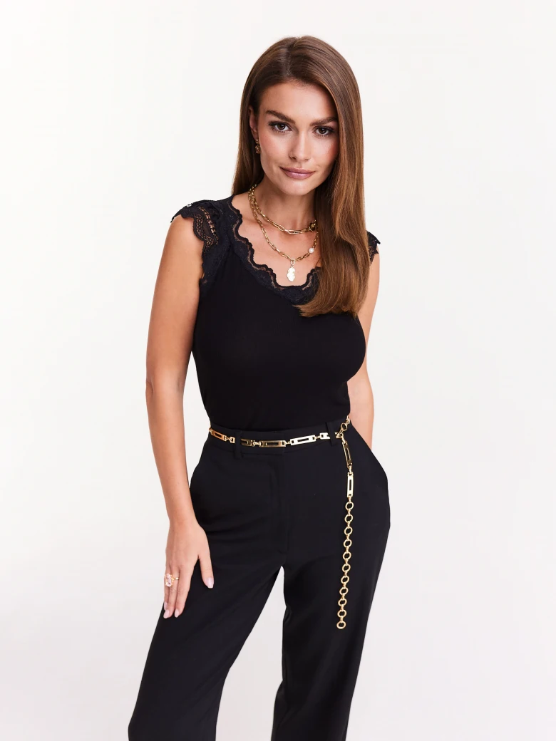 Black blouse with lace inserts