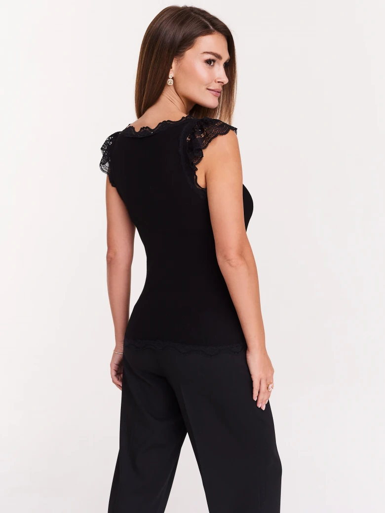 Black blouse with lace inserts