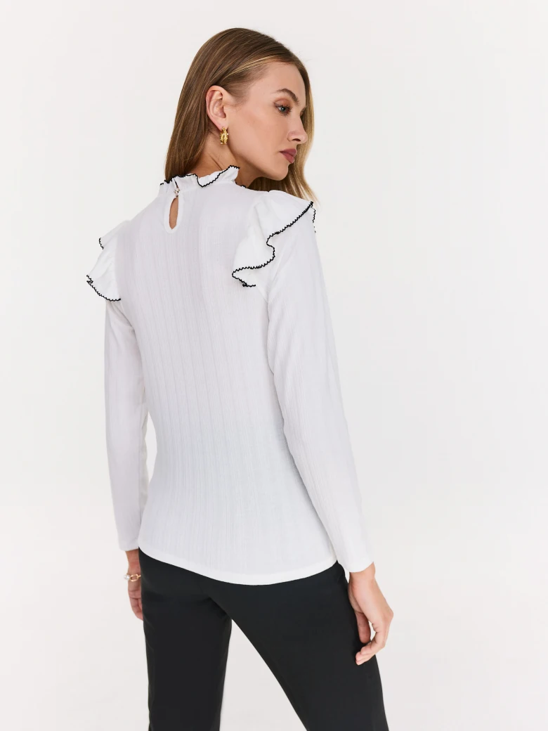 White blouse with stand-up collar and ruffles