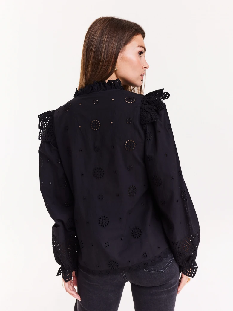 Black blouse with openwork inserts
