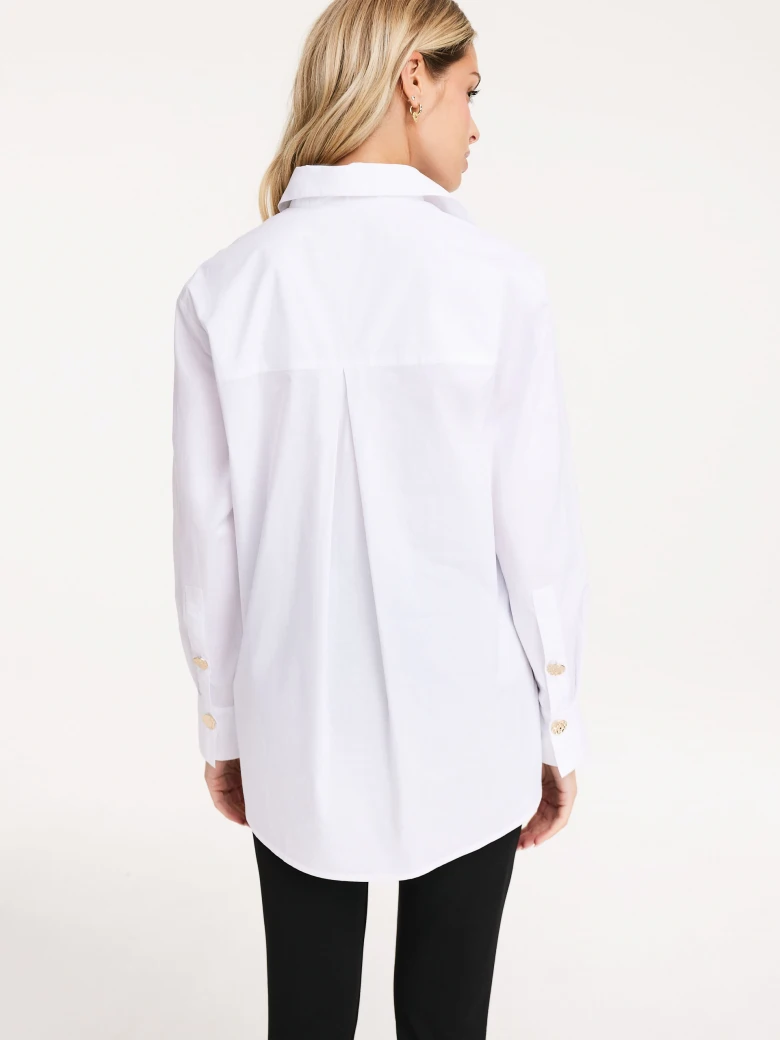 Cotton white shirt with decorative buttons