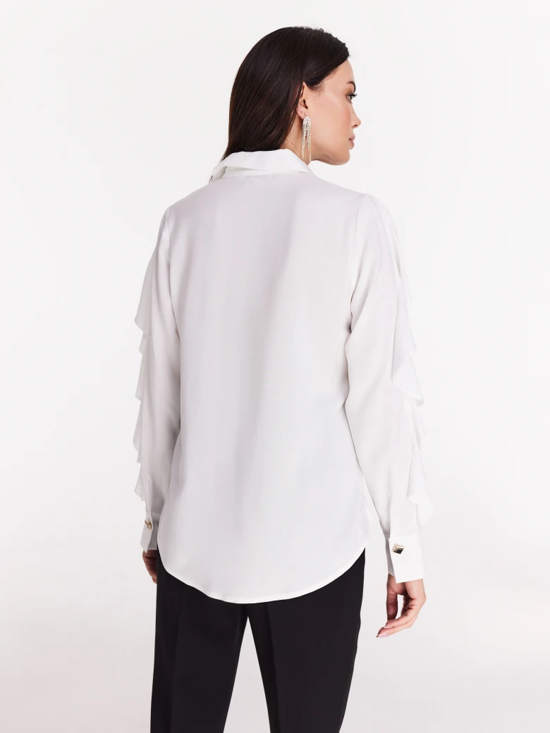 Elegant white shirt with ruffles on the sleeves