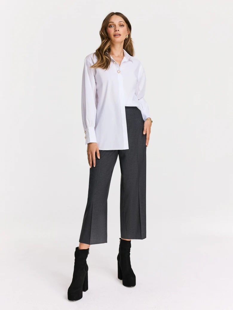 White shirt with decorative buttons
