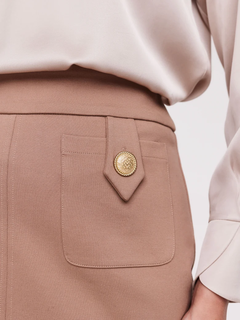 High-waisted pencil skirt in a warm shade of beige