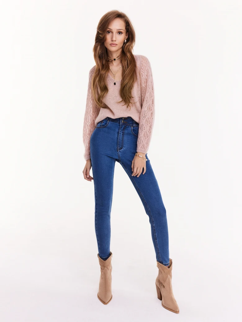 Pink sweater with openwork sleeves