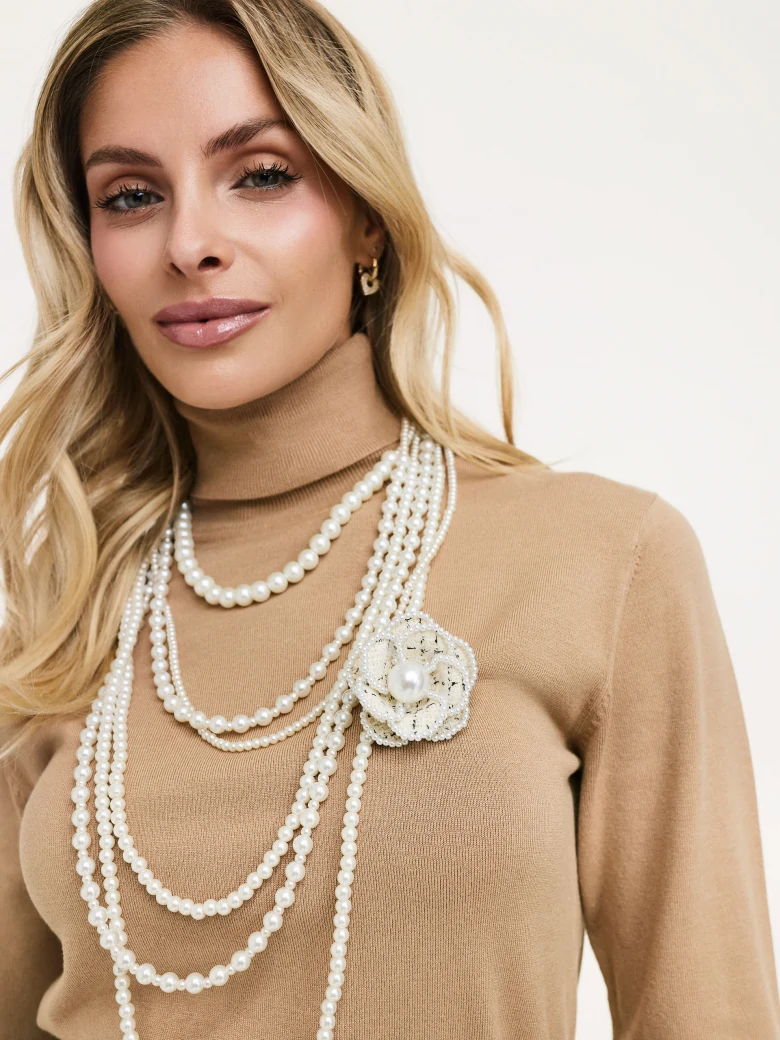 Beige turtleneck sweater