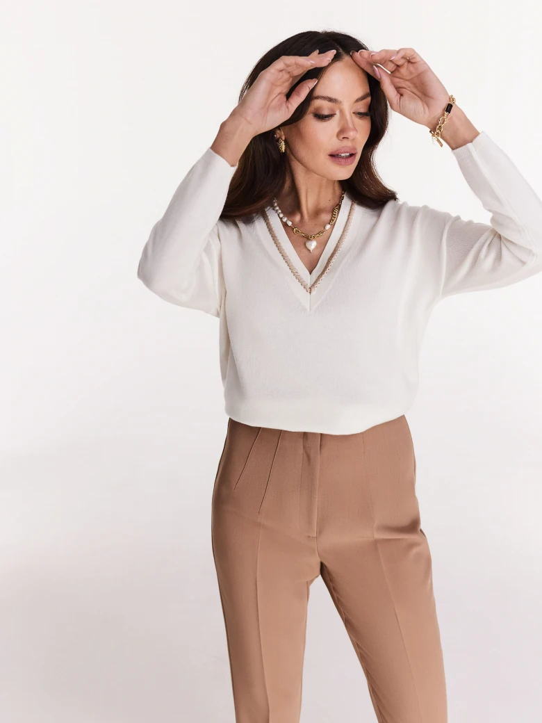 White oversize sweater with heart neckline