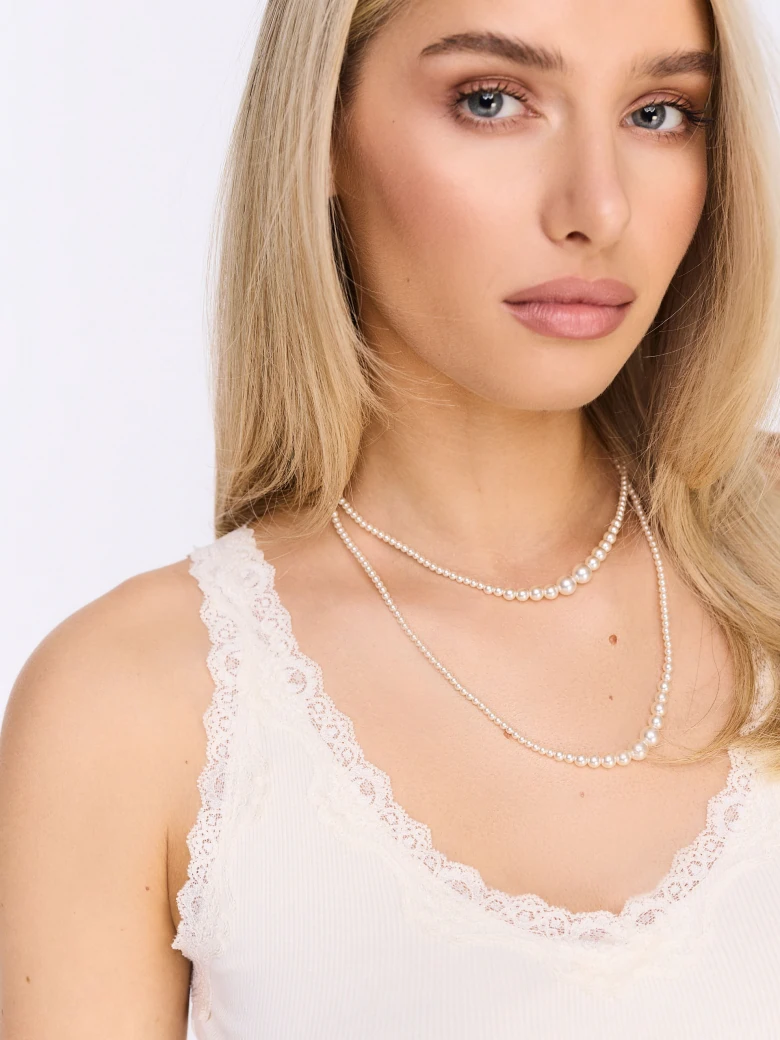 Cream rayon top with lace trim