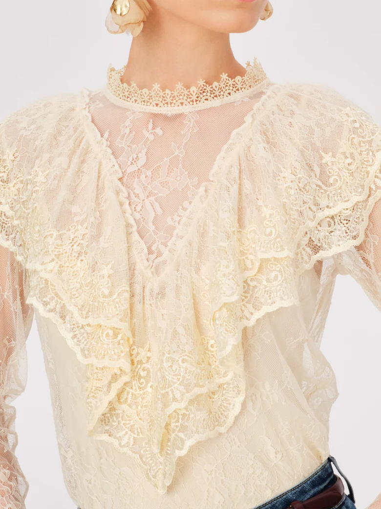 Lace cream blouse with embellishments