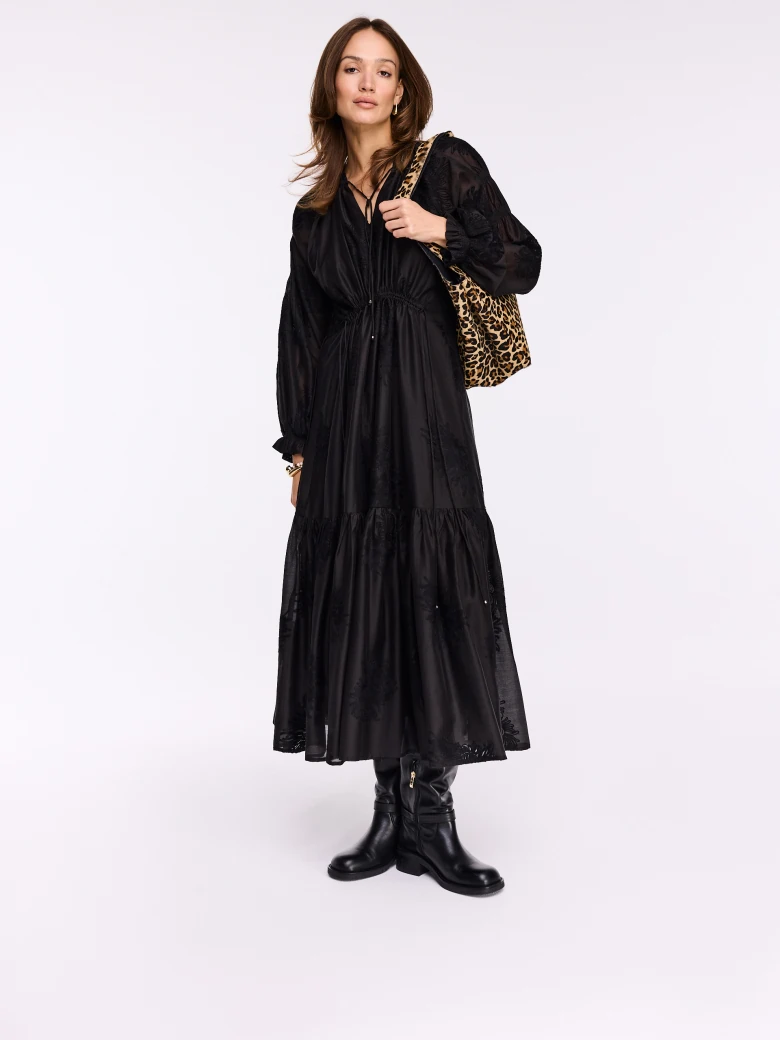 Flared black dress with floral embroidery