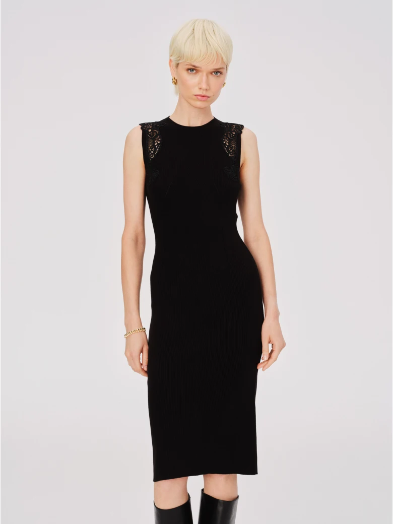 Black fitted dress with openwork inserts