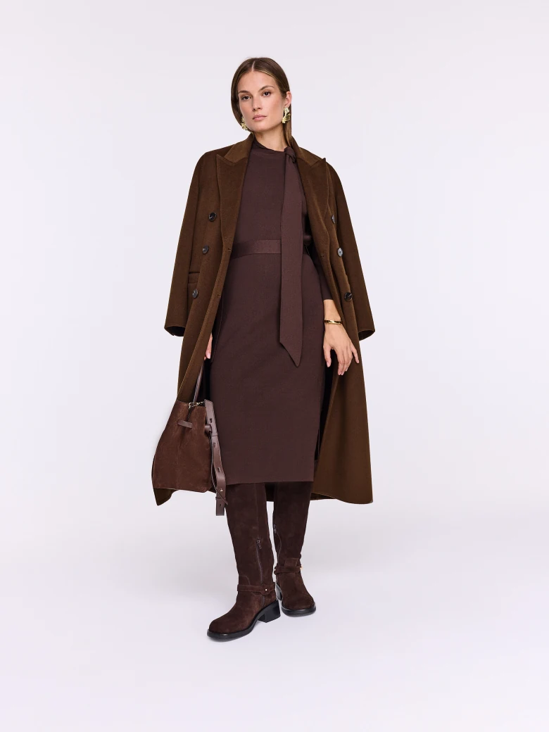 Chocolate knit dress with a tie at the neckline