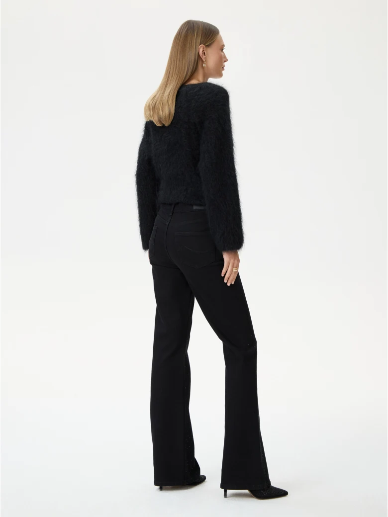 Black bell-bottom pants with shiny detail
