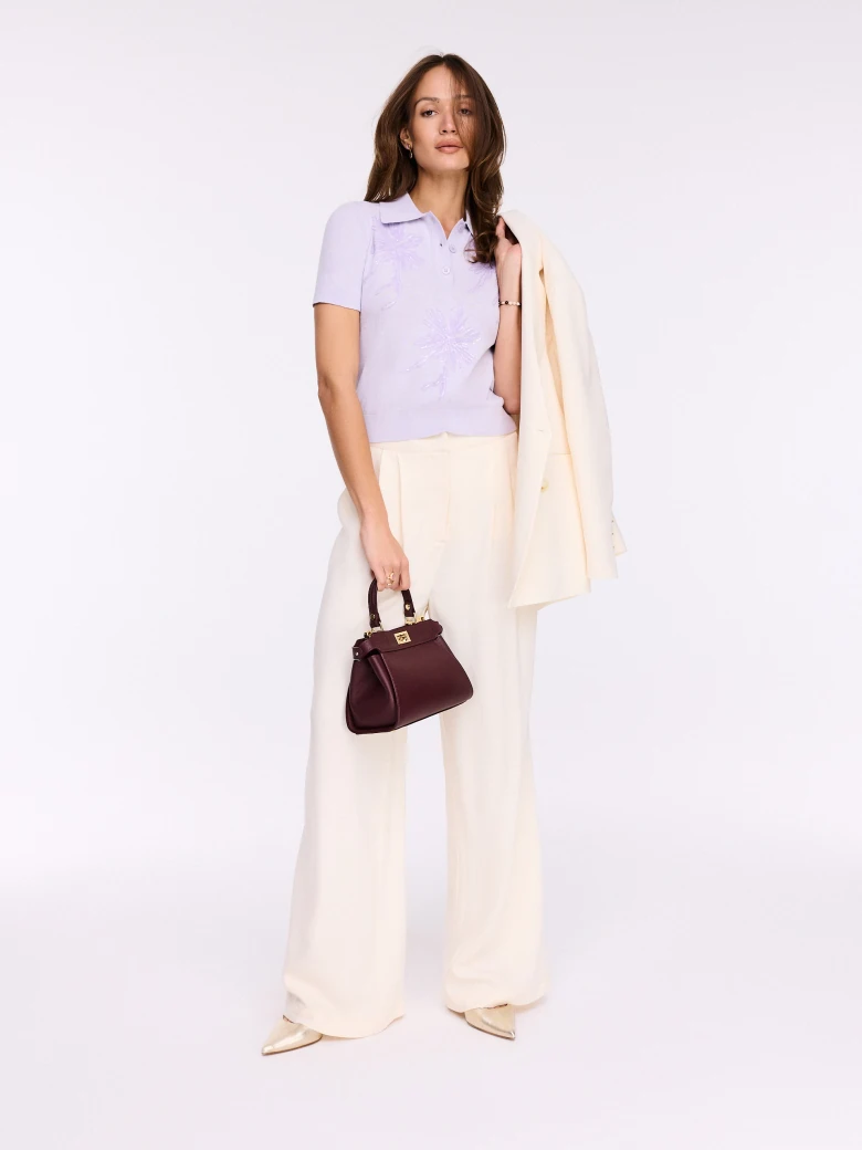Lilac polo sweater with embroidered appliqués