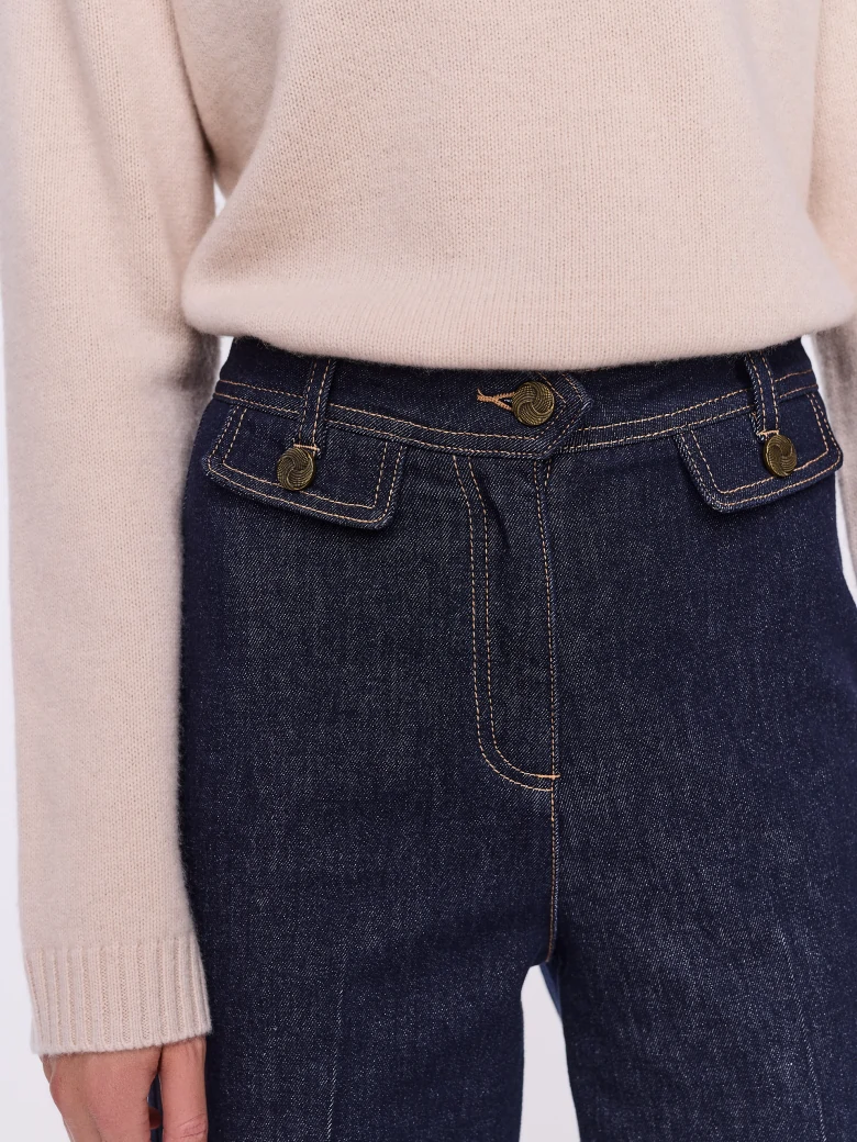 Beige wool sweater with a simple cut