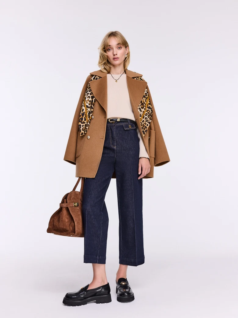 Beige wool sweater with a simple cut