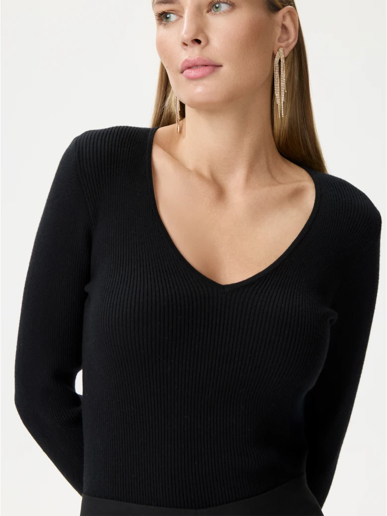 Fitted black ribbed knit sweater