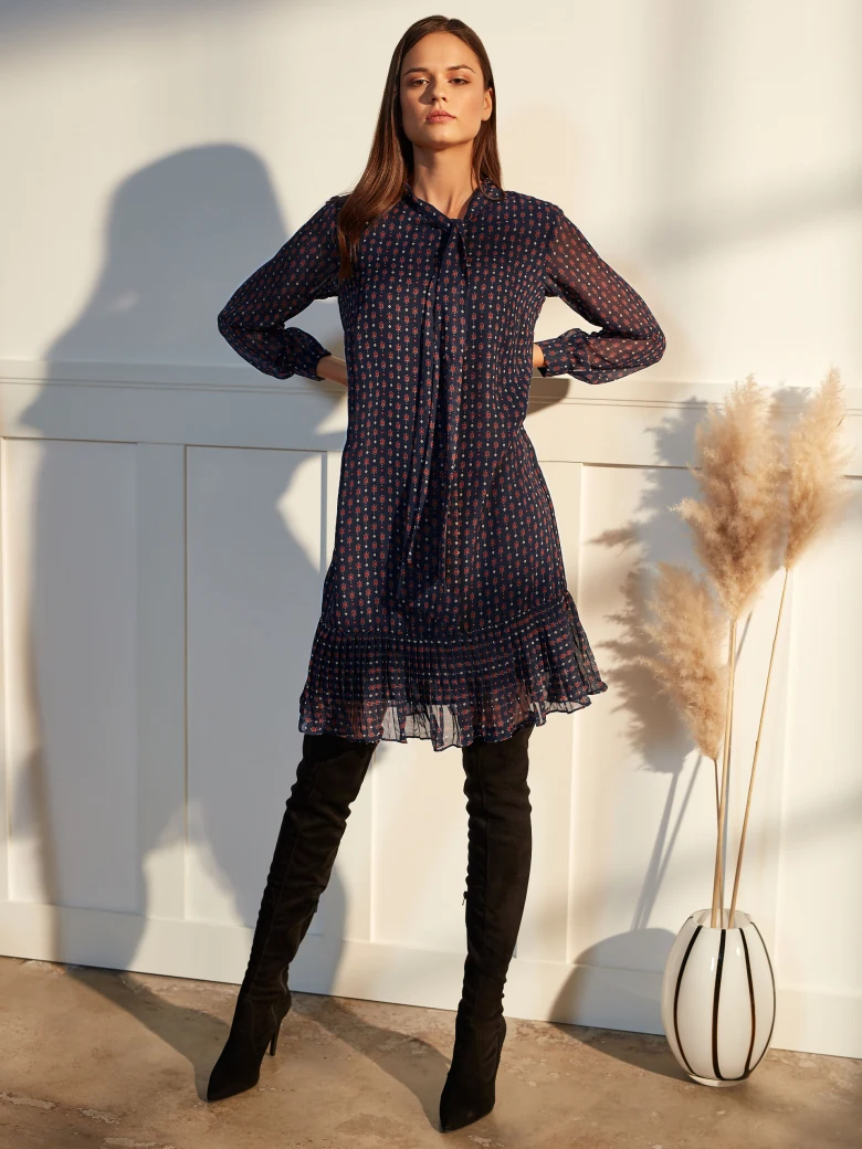 DRESS WITH A RUFFLE AT THE BOTTOM